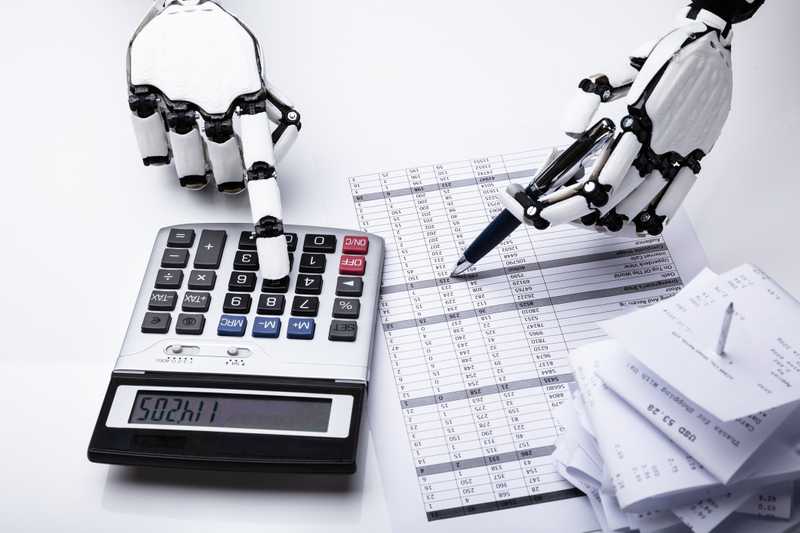 A robot using a calculator